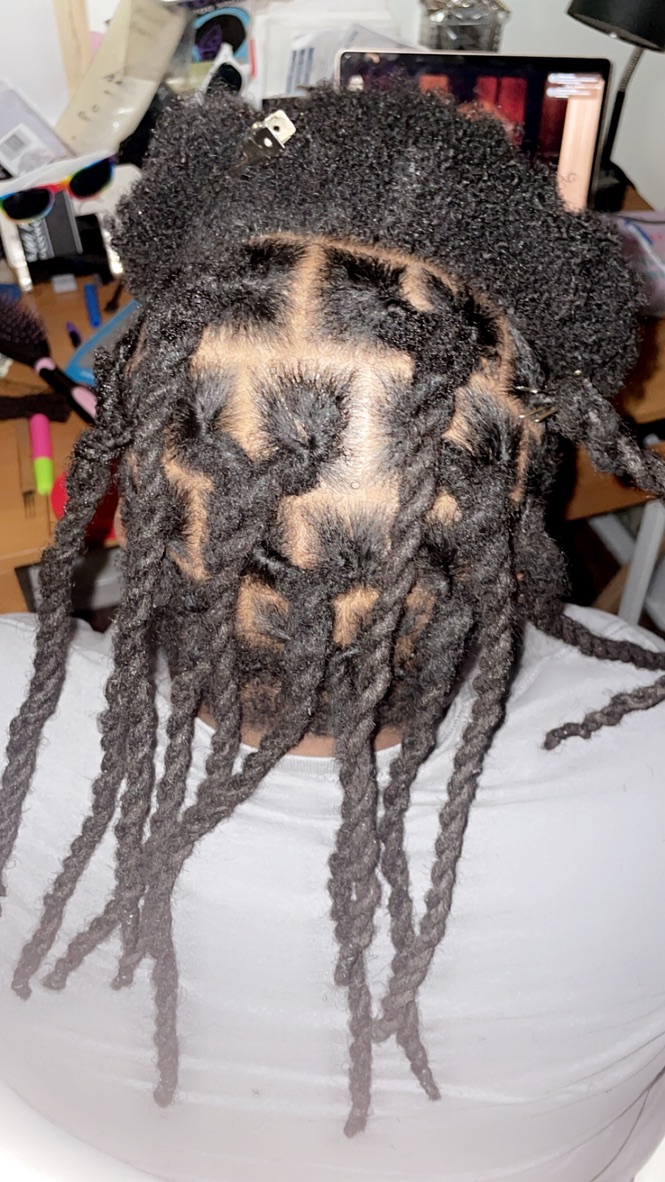 Human hair loc installation finished look